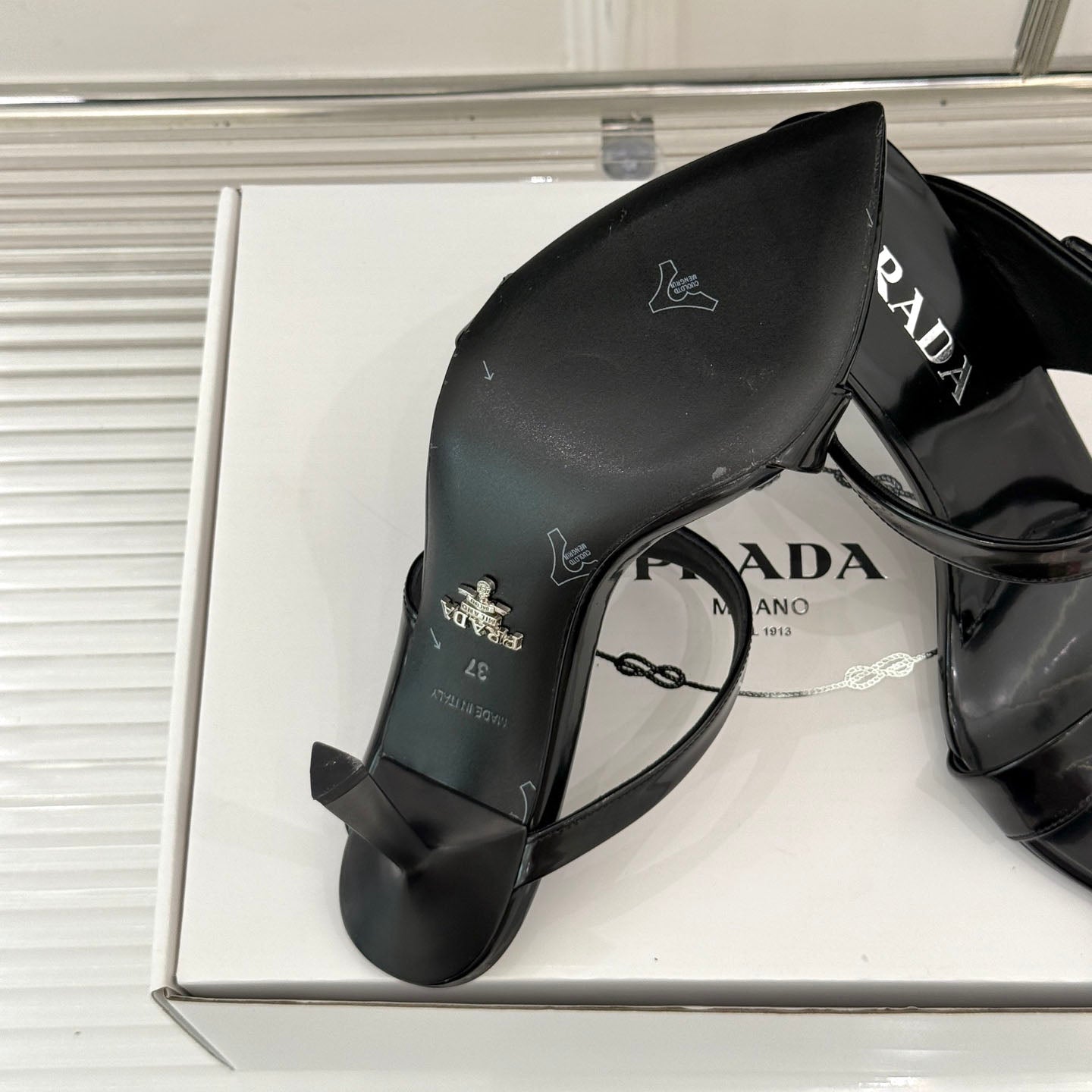 PR Triangle logo pointed toe sandals 1825061002