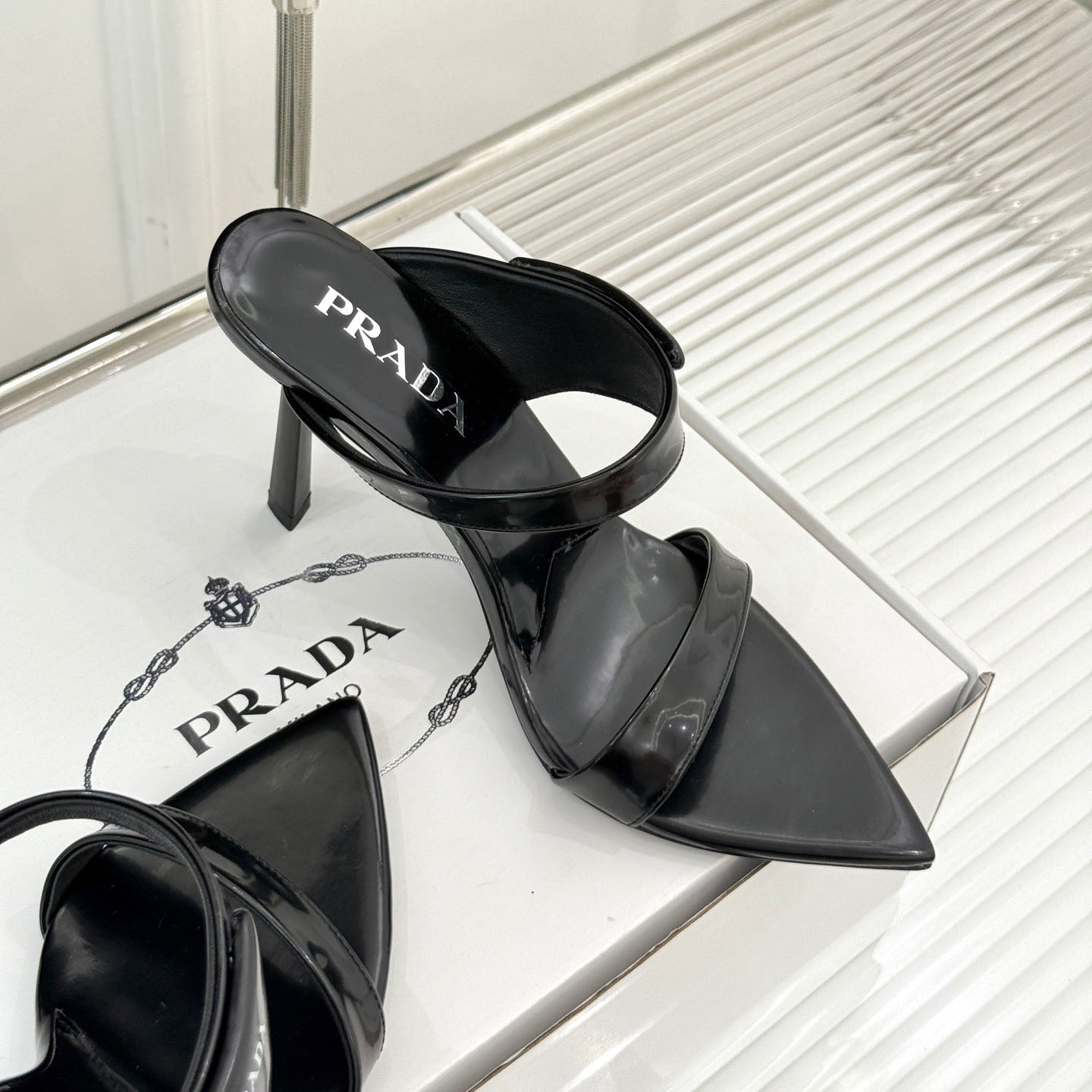 PR Triangle logo pointed toe sandals 1825061002